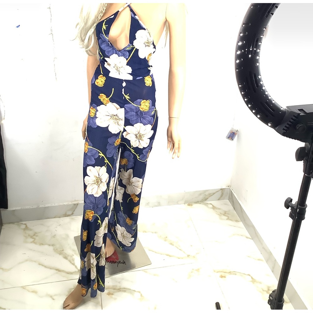 Flower printed Romper. Low V Neck, String Tie back. (See through)